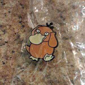 Pokemon Psyduck Orange and Yellow Pin